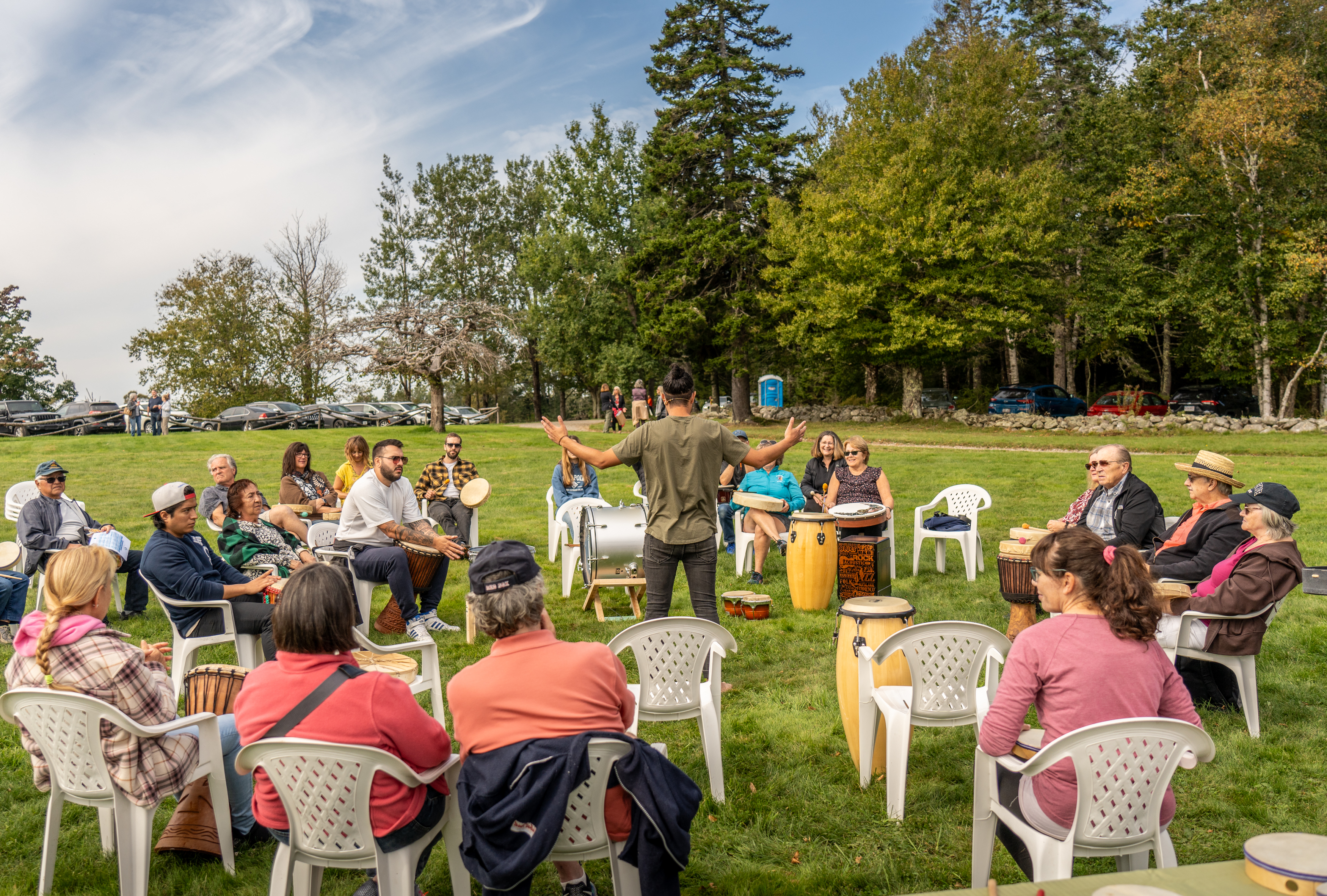 Facilitated drum circle session — Aluna